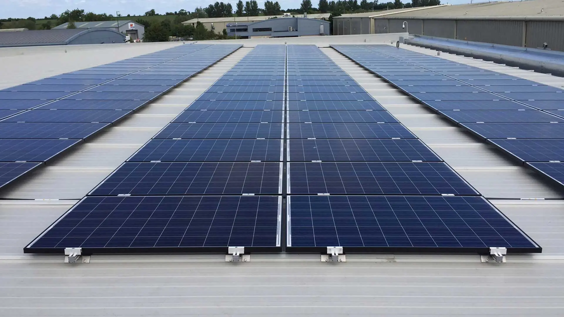 Rows of solar panels on a commercial flat roof